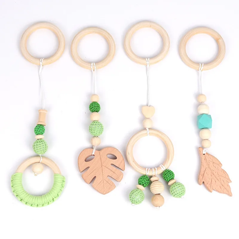 Baby Game Fitness Frame Beech Ring Leaf Shape Stroller Hanging Pendant Toy Teeth Ring Nursing Rattle Toy Room Decoration
Baby Game Fitness Frame Beech Ring Leaf Shape Stroller Hanging Pendant Toy Teeth Ring Nursing Rattle Toy Room Decoration