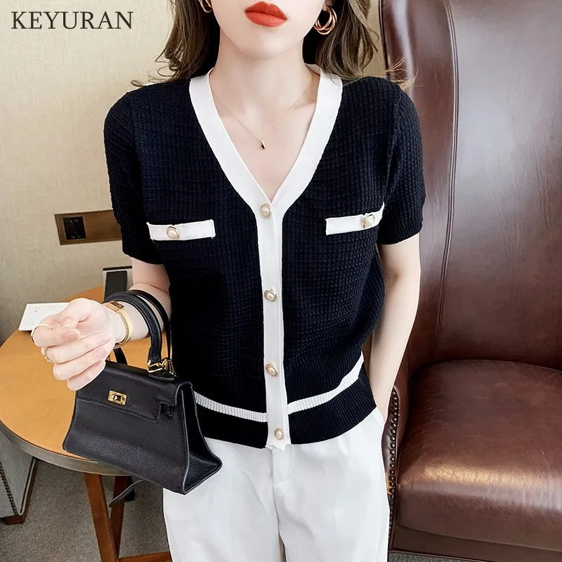 Color-blocked Vintage Elegant Knitted Cardigan Women Summer Short Sleeve V-neck Single Breasted Sweater Tops Slim Ladies Jumpers
Color-blocked Vintage Elegant Knitted Cardigan Women Summer Short Sleeve V-neck Single Breasted Sweater Tops Slim Ladies Jumpers