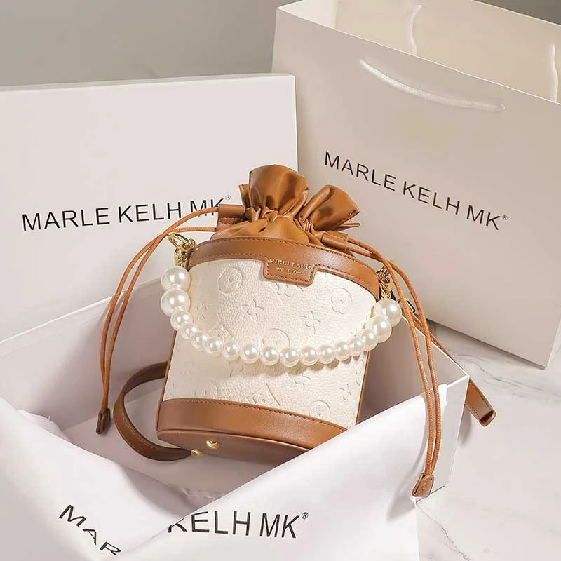 Mk Leather Embossed Hit Color Round Bucket Bag New Wild Chain Pearl Shoulder Messenger Portable Bucket Bag Female
Mk Leather Embossed Hit Color Round Bucket Bag New Wild Chain Pearl Shoulder Messenger Portable Bucket Bag Female