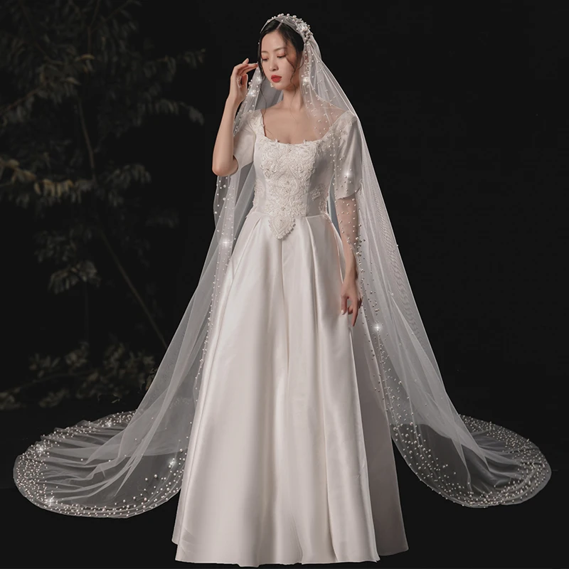 2021 New Pearl Long Bridal Wedding Veil For Women Retro Cathedral White Soft Tulle Beaded Wedding Modeling Accessories Heddress
2021 New Pearl Long Bridal Wedding Veil For Women Retro Cathedral White Soft Tulle Beaded Wedding Modeling Accessories Heddress