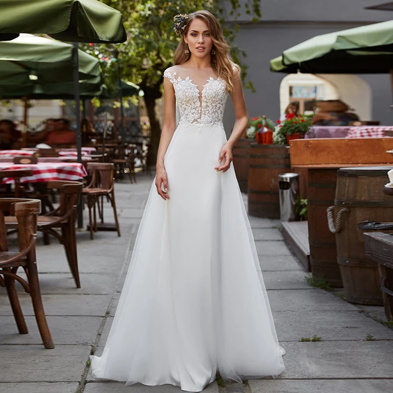 Elegant Lace Sheer Neck A-Line Wedding Dress Cap Sleeves Maternity Pregnant Beach Custom Made Bridal Gowns 2021
Elegant Lace Sheer Neck A-Line Wedding Dress Cap Sleeves Maternity Pregnant Beach Custom Made Bridal Gowns 2021
