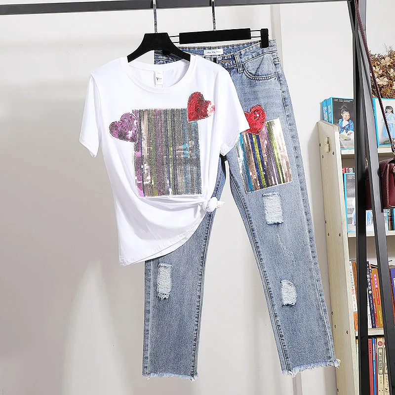 2021 Summer Korean Sequins T-shirt Holes Denim Pants Set Women White Tee shirt Calf-Length Jeans Pants Two Piece Outfits Female
2021 Summer Korean Sequins T-shirt Holes Denim Pants Set Women White Tee shirt Calf-Length Jeans Pants Two Piece Outfits Female