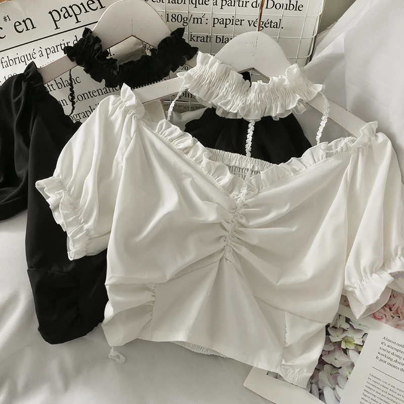 Женская футболка с открытыми плечами, коротким рукавом и лямкой на шее
Женская футболка с открытыми плечами, коротким рукавом и лямкой на шее