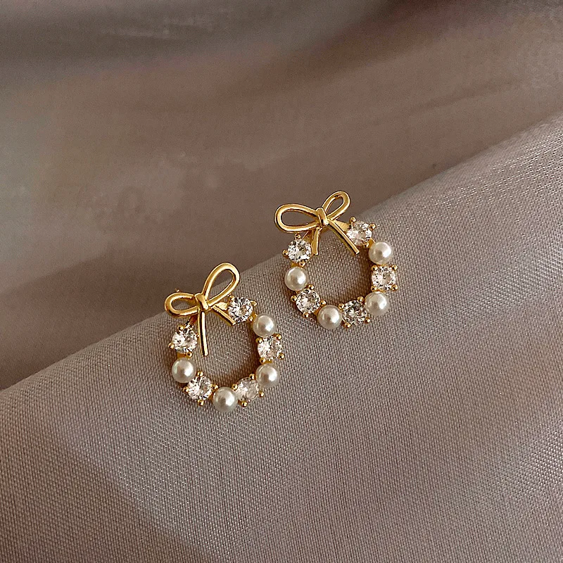 2022 New S925 Silver Small Bow Earrings Pearl Ear Studs for Women Simple INS Fashion Jewelry
2022 New S925 Silver Small Bow Earrings Pearl Ear Studs for Women Simple INS Fashion Jewelry