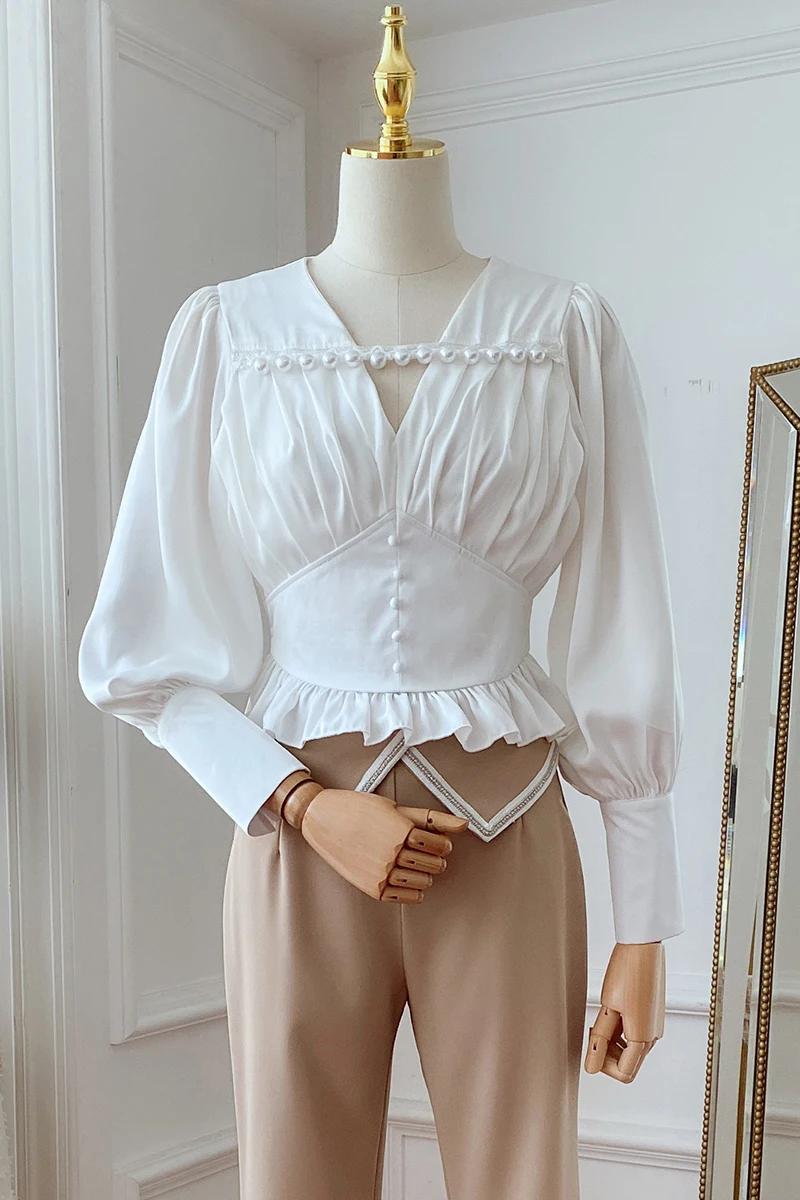 Spring Female New Beaded Folds V-neck Pleated Shirt Elegant Wooden Ear Hem Slim-waist Blouse for Women Sexy All-matching Top
Spring Female New Beaded Folds V-neck Pleated Shirt Elegant Wooden Ear Hem Slim-waist Blouse for Women Sexy All-matching Top