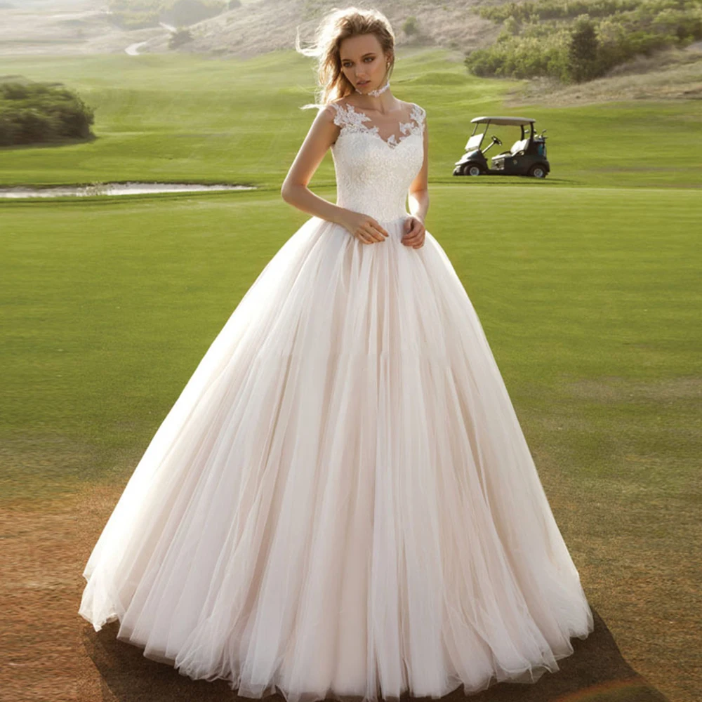 A-Line Pink Tulle Wedding Dress O-Neck Sleeveless Button Lace Appliques Sweep Train 2021 Bride Gowns Vestido De Noiva
A-Line Pink Tulle Wedding Dress O-Neck Sleeveless Button Lace Appliques Sweep Train 2021 Bride Gowns Vestido De Noiva