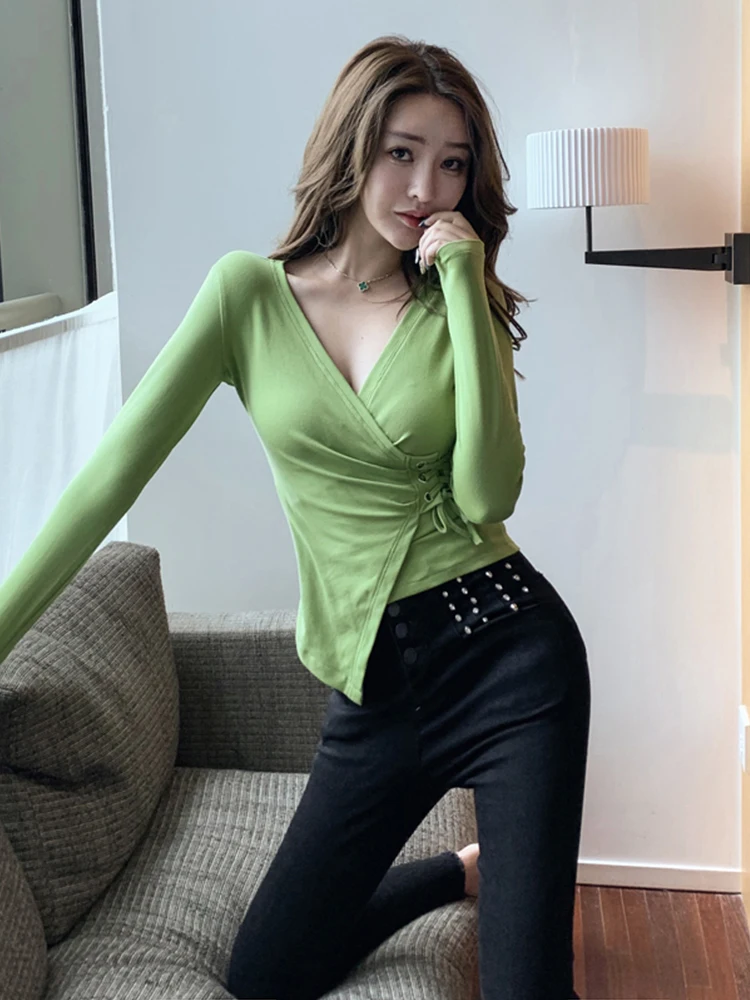 Irregular cross V-neck top women's autumn low cut sexy bottom shirt personality slim waist tie long sleeve T-shirt
Irregular cross V-neck top women's autumn low cut sexy bottom shirt personality slim waist tie long sleeve T-shirt