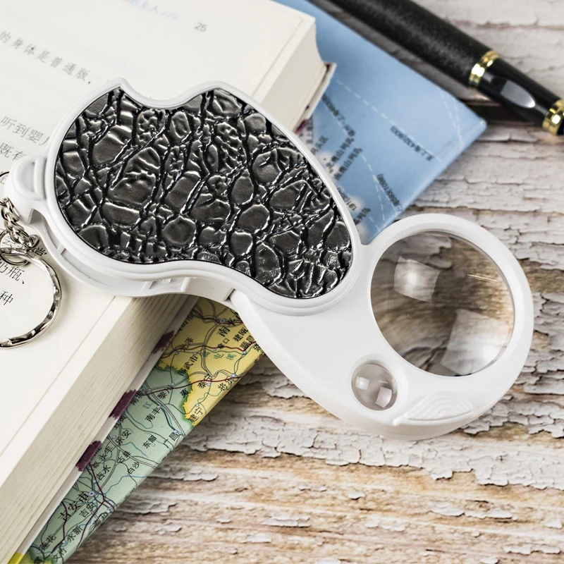Foldable Double Magnifying Glass with Key Chain Keychain Reading Glass Loupe Pocket Magnifier With LED 8X 20X Outdoor Tools W1
Foldable Double Magnifying Glass with Key Chain Keychain Reading Glass Loupe Pocket Magnifier With LED 8X 20X Outdoor Tools W1