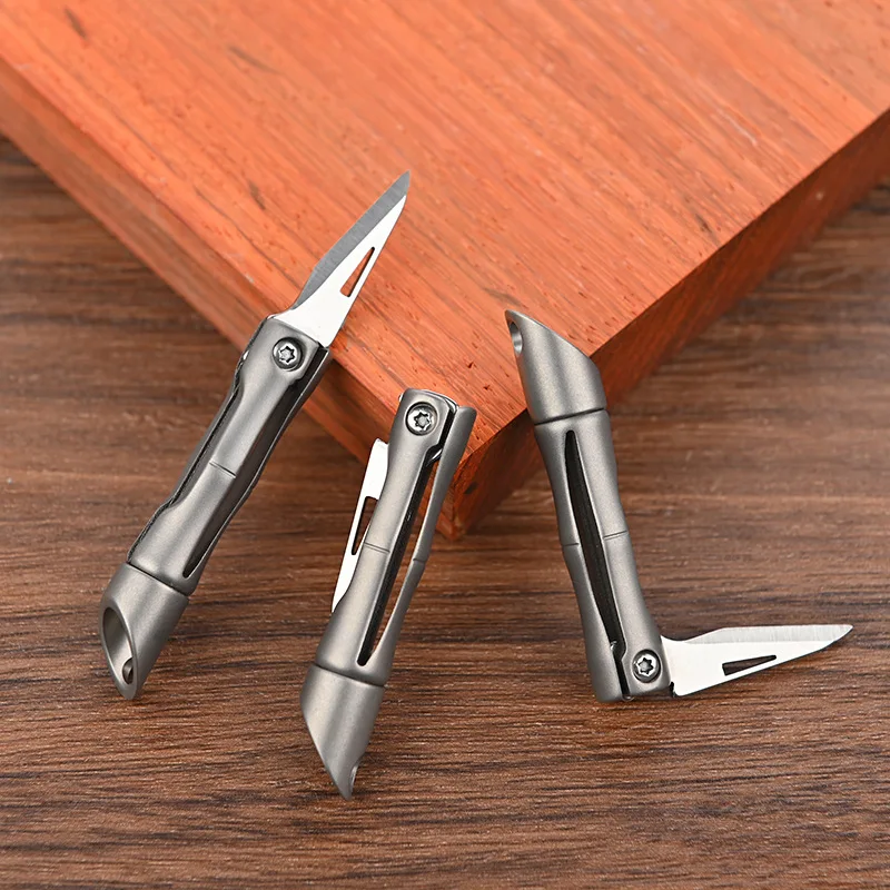 1Pc Titanium Alloy Mini Unboxing Folding Knife CS GO Portable Bamboo Joint Portable Hanging Outdoor EDC Knife with Keychain
1Pc Titanium Alloy Mini Unboxing Folding Knife CS GO Portable Bamboo Joint Portable Hanging Outdoor EDC Knife with Keychain