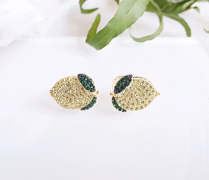 Lemon Earrings 925 pure silver micro inlaid zircon fashion simple personality refined elegant design
Lemon Earrings 925 pure silver micro inlaid zircon fashion simple personality refined elegant design