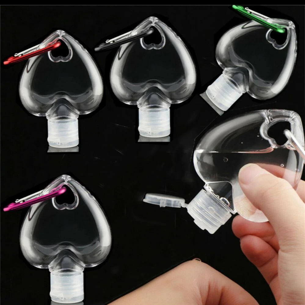 30/50ml Portable Heart Shape Spray Bottle Separate Bottling With Key Ring Hook Travel Refillable Empty Bottle Alcohol Containers
30/50ml Portable Heart Shape Spray Bottle Separate Bottling With Key Ring Hook Travel Refillable Empty Bottle Alcohol Containers