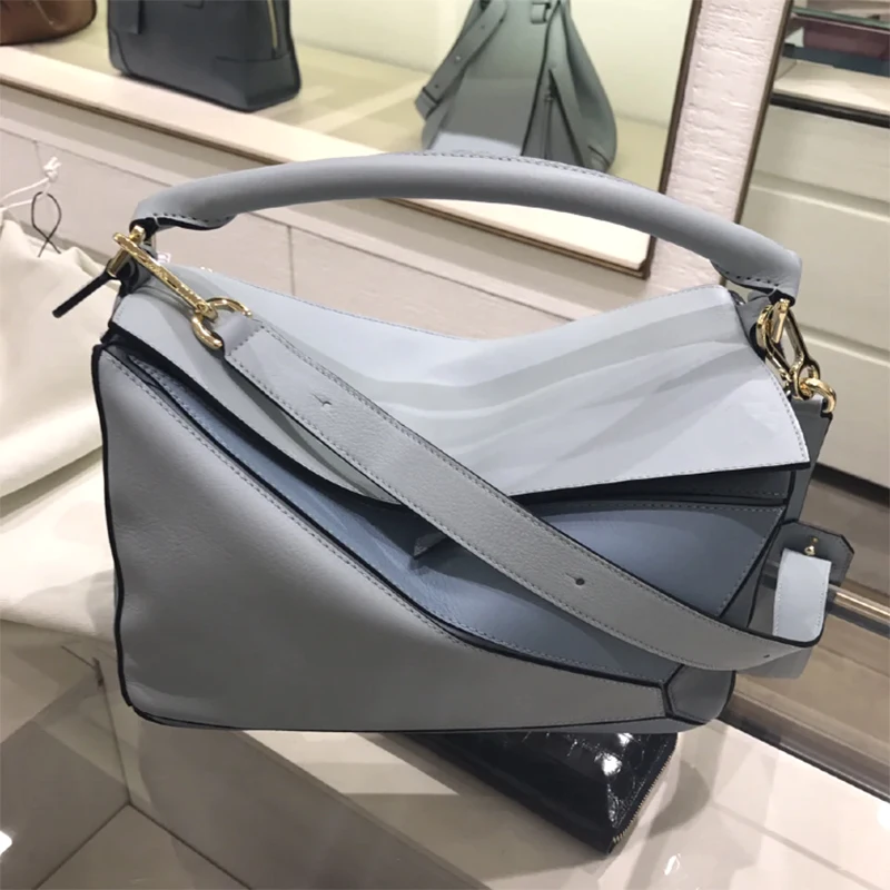 2021 New Celebrity Inspired Mini Geometric Bag Pillow Bag Genuine Leather Splicing Package Shoulder Bag Women's Messenger Bag
2021 New Celebrity Inspired Mini Geometric Bag Pillow Bag Genuine Leather Splicing Package Shoulder Bag Women's Messenger Bag