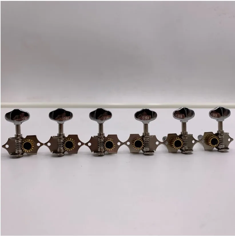 6PCS 18:1 Gear Ratio Vintage Open Gear String Tuners Tuning Pegs Middle Hole for Classic Guitar Chrome
6PCS 18:1 Gear Ratio Vintage Open Gear String Tuners Tuning Pegs Middle Hole for Classic Guitar Chrome