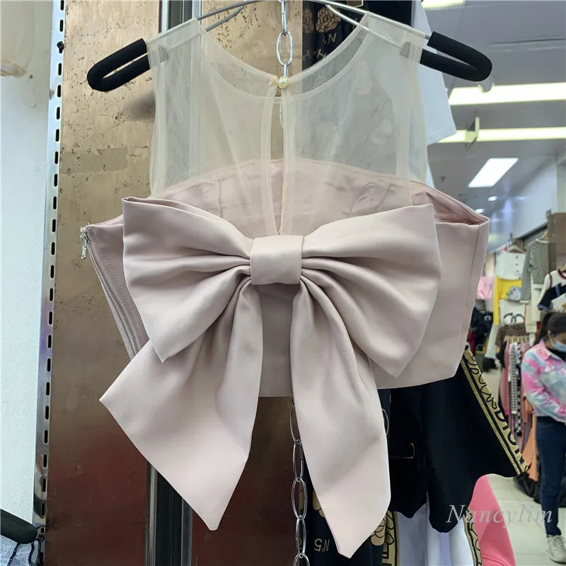 New Backless Sexy All-Matching Three-Dimensional Bow Top Mesh Stitching Sleeveless Short Shirt for Women Blusas Mujer
New Backless Sexy All-Matching Three-Dimensional Bow Top Mesh Stitching Sleeveless Short Shirt for Women Blusas Mujer