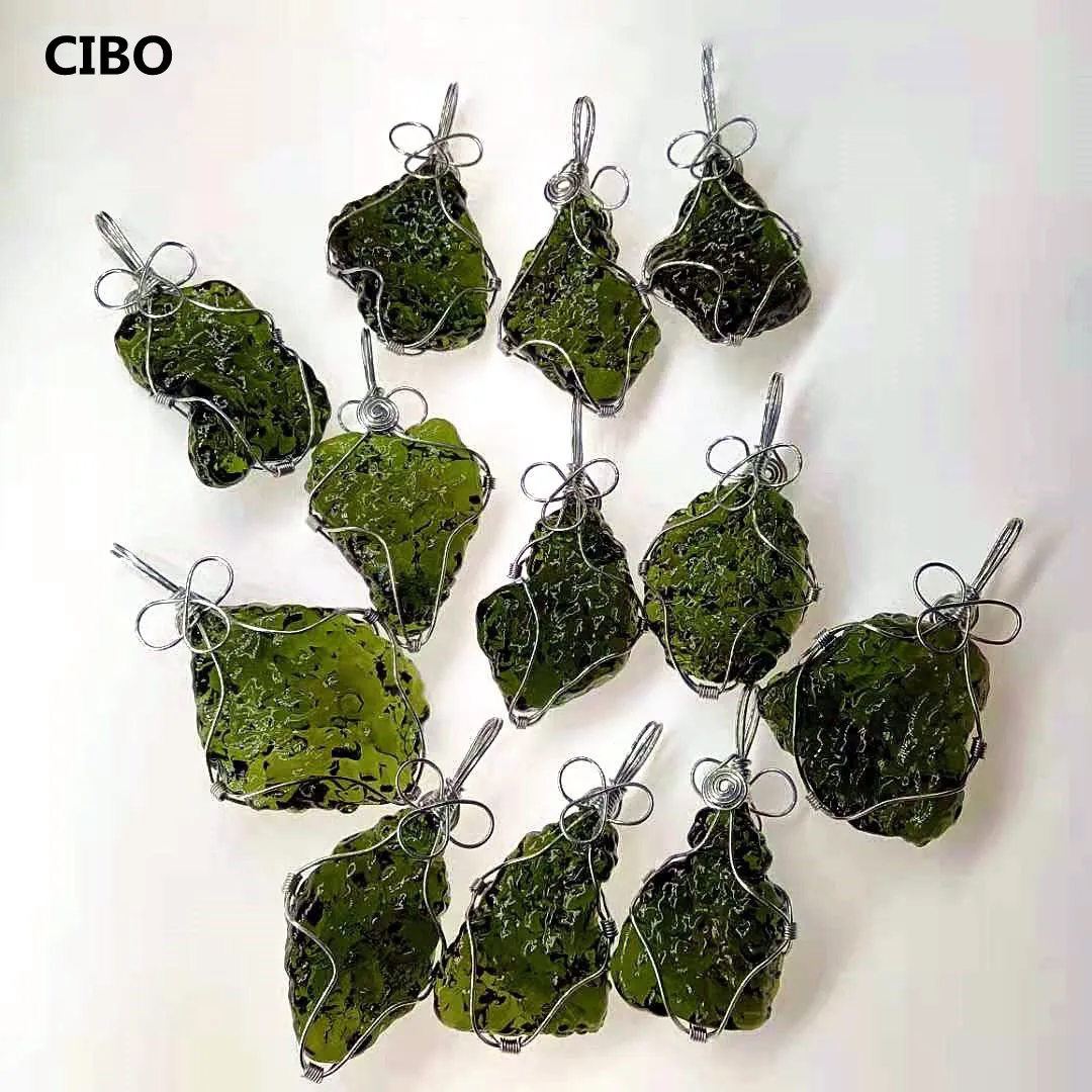 CIBO Meteorite natural crystal pendant green glass rough pendant shaped copper wire edging pendant
CIBO Meteorite natural crystal pendant green glass rough pendant shaped copper wire edging pendant