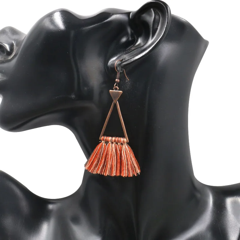 Hot Selling European and American Geometric Hollow Triangle Fabric Thread Tassel Earrings
Hot Selling European and American Geometric Hollow Triangle Fabric Thread Tassel Earrings