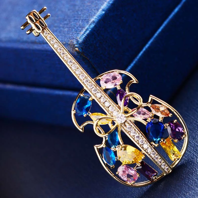Fashion Luxury Sparkling Color Stones Guitar Brooch Women's Winter Clothing Accessories High Quality Funny Pins For Backpacks
Fashion Luxury Sparkling Color Stones Guitar Brooch Women's Winter Clothing Accessories High Quality Funny Pins For Backpacks