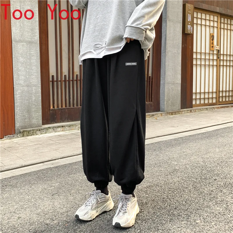 Spring trend sports pants male Korean version loose wide leg bandage handsome jokey casual pants trend
Spring trend sports pants male Korean version loose wide leg bandage handsome jokey casual pants trend