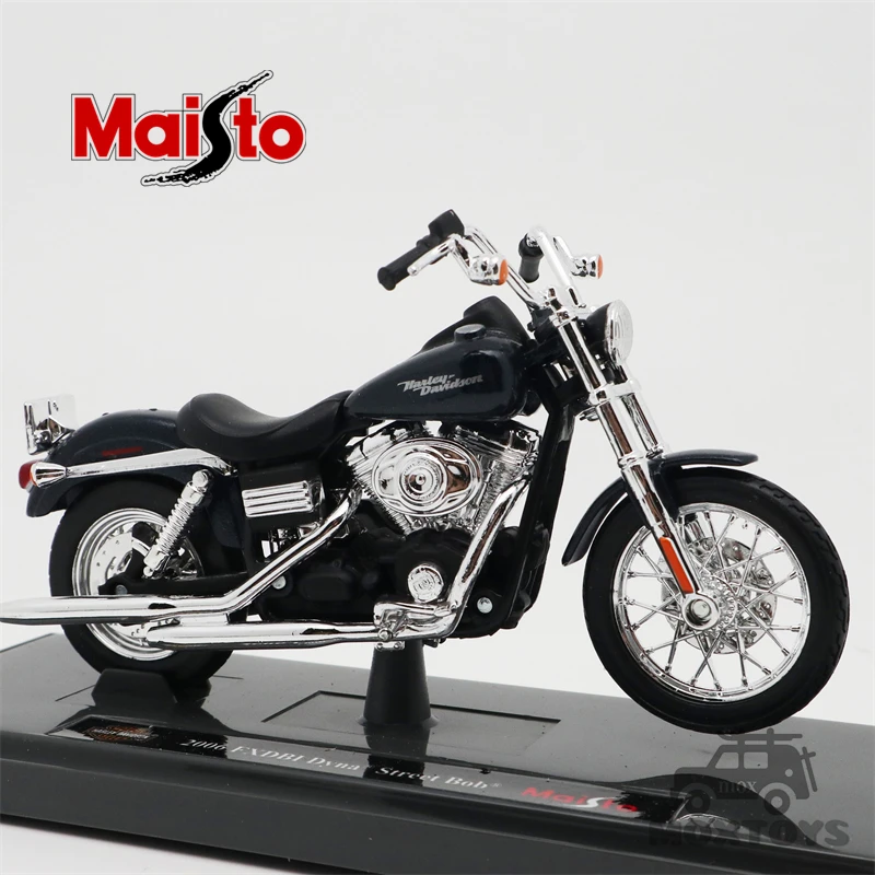 Maisto 1:18 Harley-Davision 2006 Dyna Street Bob темно-синий Литая модель мотоцикла
Maisto 1:18 Harley-Davision 2006 Dyna Street Bob темно-синий Литая модель мотоцикла