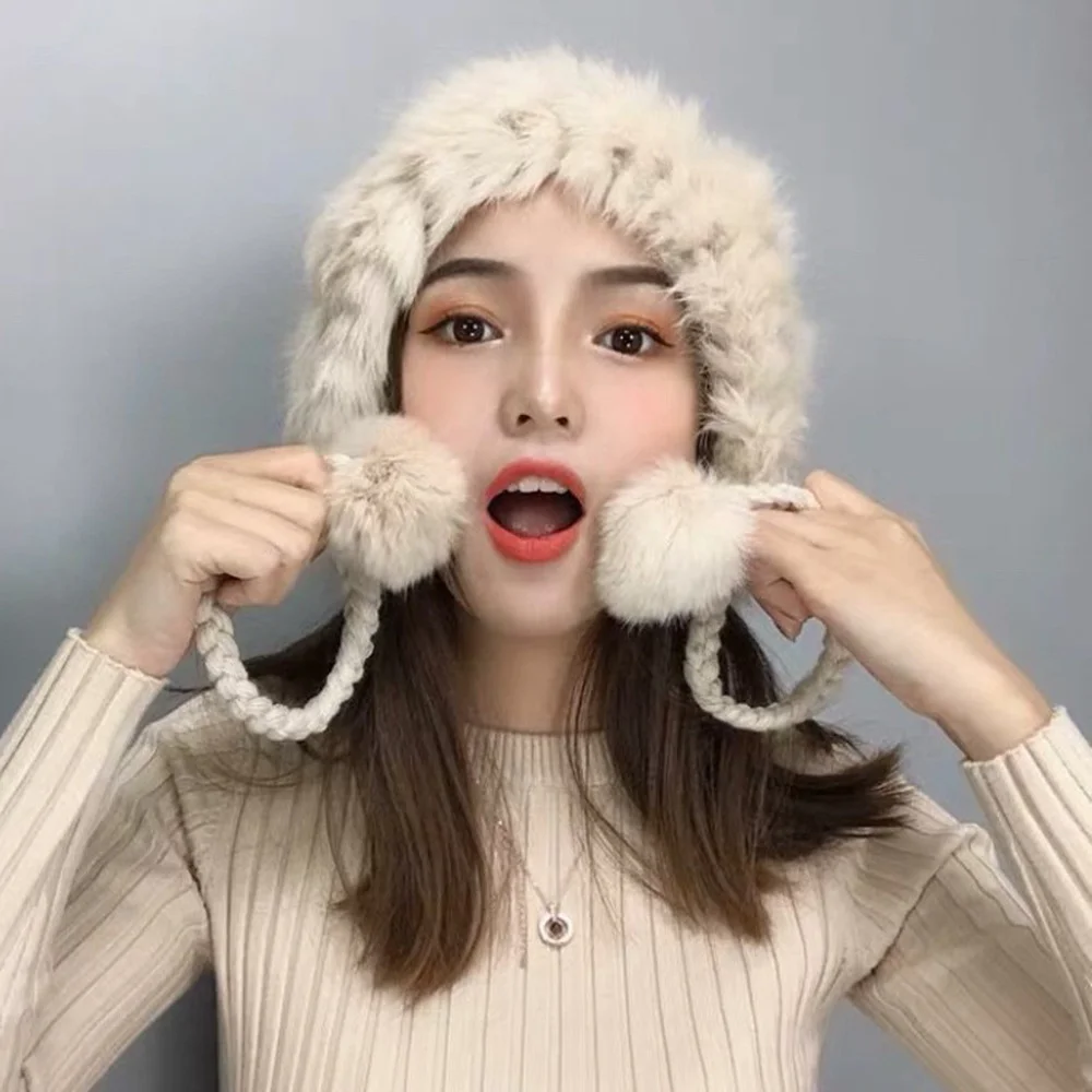 Женская вязаная шапка-ушанка из кроличьего меха
Женская вязаная шапка-ушанка из кроличьего меха