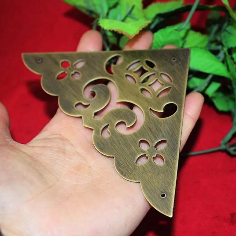 Brass Coners Filigree Triangle Cabochon,Vintage Covers,Flatback Metal Embellishments Scrapbooking,Wooden Box Decor,10.5cm,16Pcs
Brass Coners Filigree Triangle Cabochon,Vintage Covers,Flatback Metal Embellishments Scrapbooking,Wooden Box Decor,10.5cm,16Pcs