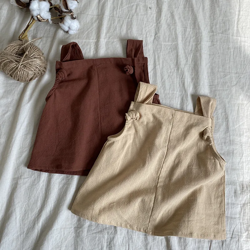 Girls summer solid color sling T shirts 2021 baby children cotton linen sleeveless Tops
Girls summer solid color sling T shirts 2021 baby children cotton linen sleeveless Tops