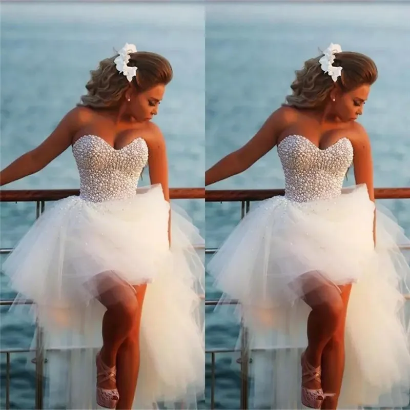 2020 A Line Sweetheart Exquisite Pearl Hi-Lo Short Beach Wedding Dresses With Custom Made Beaded Bridal Gowns
2020 A Line Sweetheart Exquisite Pearl Hi-Lo Short Beach Wedding Dresses With Custom Made Beaded Bridal Gowns