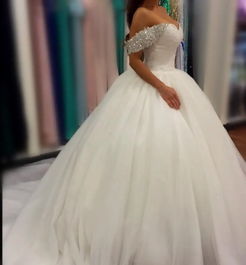 Luxury Ball Gown Wedding Dresses 2020 Off the Shoulder Ruched Tulle Sequins Crystals Wedding Gowns Plus Size Bridal Dress Custom
Luxury Ball Gown Wedding Dresses 2020 Off the Shoulder Ruched Tulle Sequins Crystals Wedding Gowns Plus Size Bridal Dress Custom