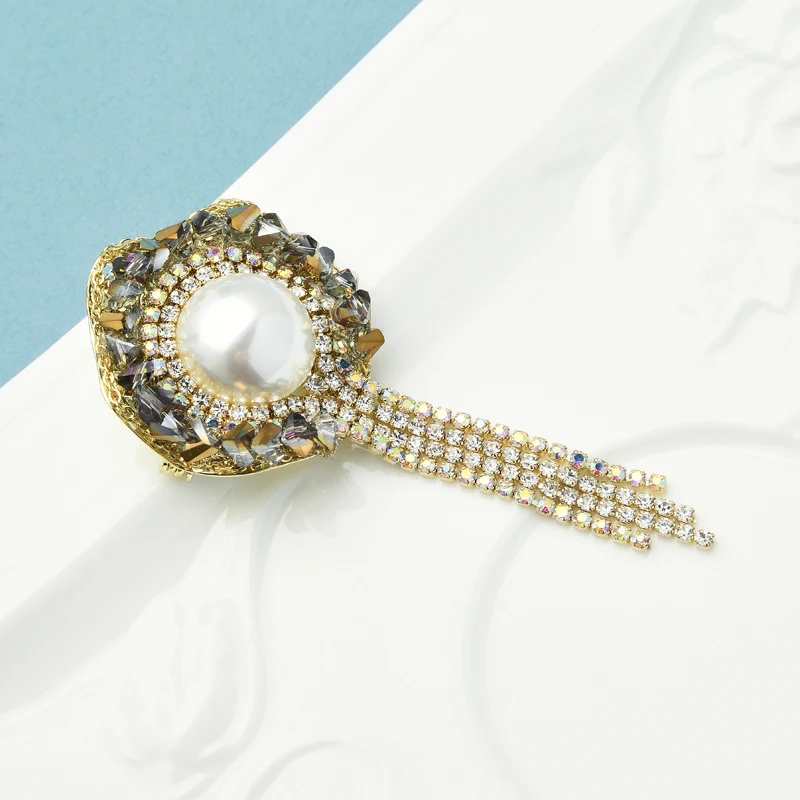 Wuli&baby Round Pearl Rhinestone Tassel Flower Brooches Women Unisex Handmade Crystal Party Office Brooch Pins Gifts
Wuli&baby Round Pearl Rhinestone Tassel Flower Brooches Women Unisex Handmade Crystal Party Office Brooch Pins Gifts