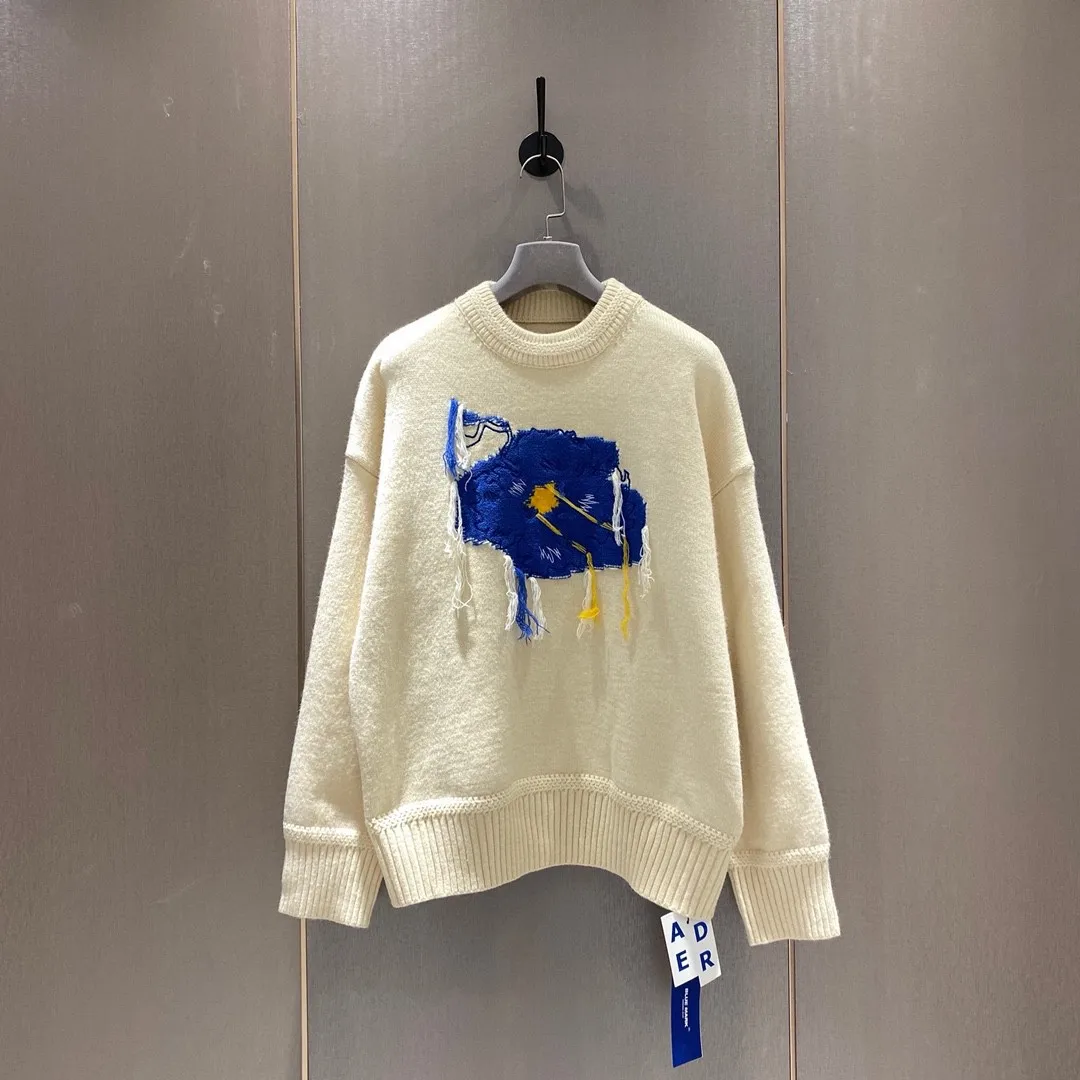 ADER ERROR sweater top, beige wool knit sweater, loose blue flowers for men and women, hand-embroidered Tassel graphic design
ADER ERROR sweater top, beige wool knit sweater, loose blue flowers for men and women, hand-embroidered Tassel graphic design