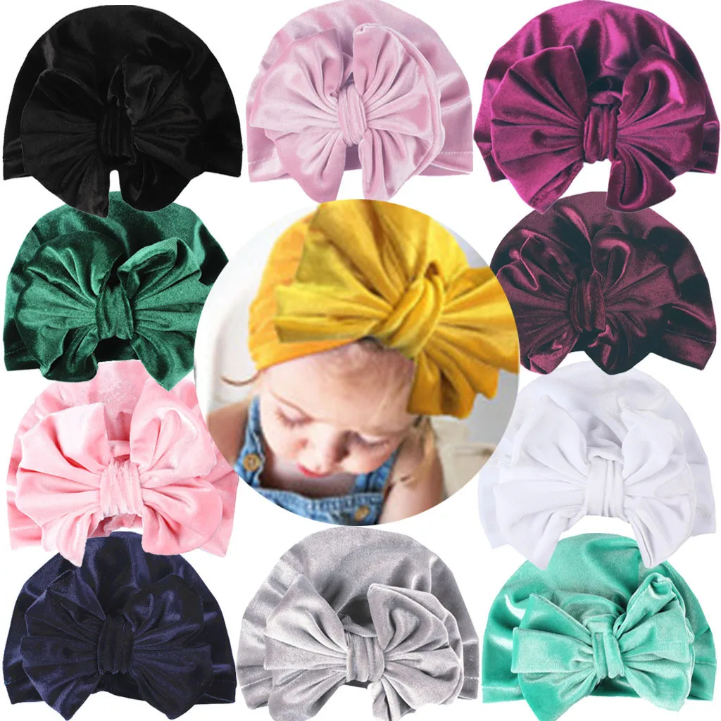 Newborn child Warm Knotted Bowknot Hat Beanie Headwear Cap European and American bow gold velvet hat L1211
Newborn child Warm Knotted Bowknot Hat Beanie Headwear Cap European and American bow gold velvet hat L1211