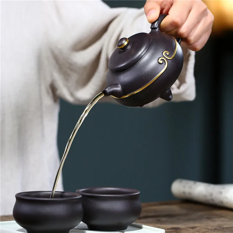 Yixing purple clay teapot set pure handmade tea set black gold sand life love kung fu tea set group wholesale agent
Yixing purple clay teapot set pure handmade tea set black gold sand life love kung fu tea set group wholesale agent