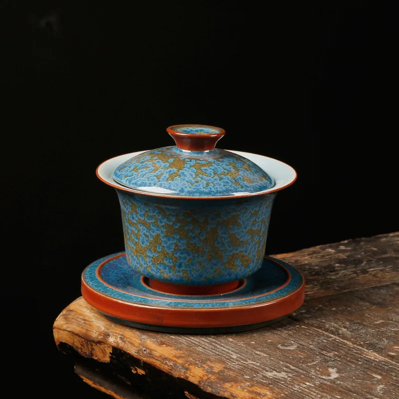 Tea set cover bowl kiln turned ceramic Sancai bowl household retro tea set tea maker Jingdezhen handmade tea bowl
Tea set cover bowl kiln turned ceramic Sancai bowl household retro tea set tea maker Jingdezhen handmade tea bowl