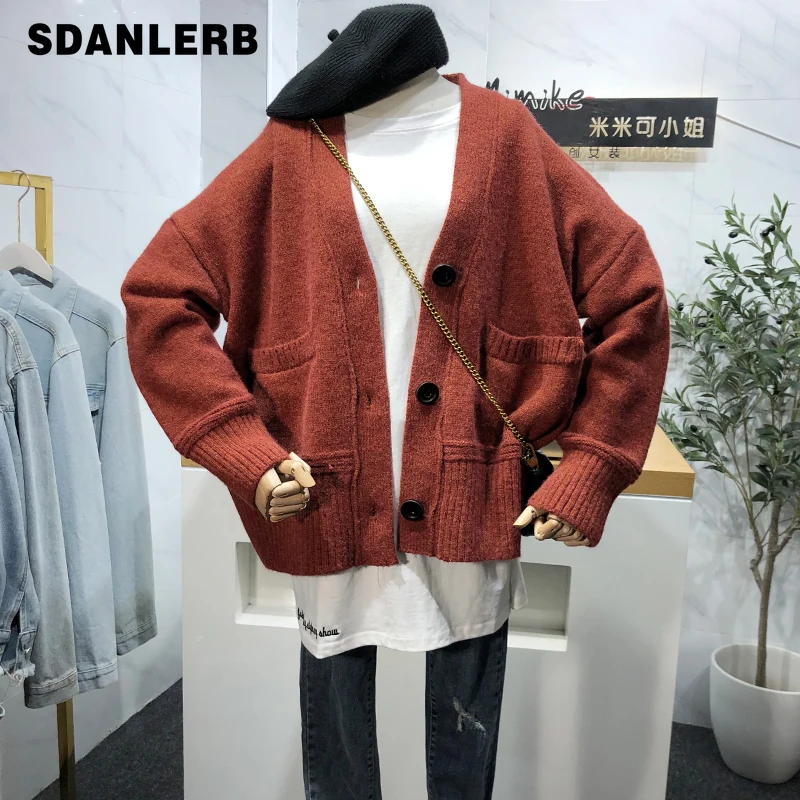 2021 Autumn New V-neck Sweater Cardigan Female Loose and Idle Long Slevee Knitwear Solid Color Fashion Student Knitted Coat
2021 Autumn New V-neck Sweater Cardigan Female Loose and Idle Long Slevee Knitwear Solid Color Fashion Student Knitted Coat