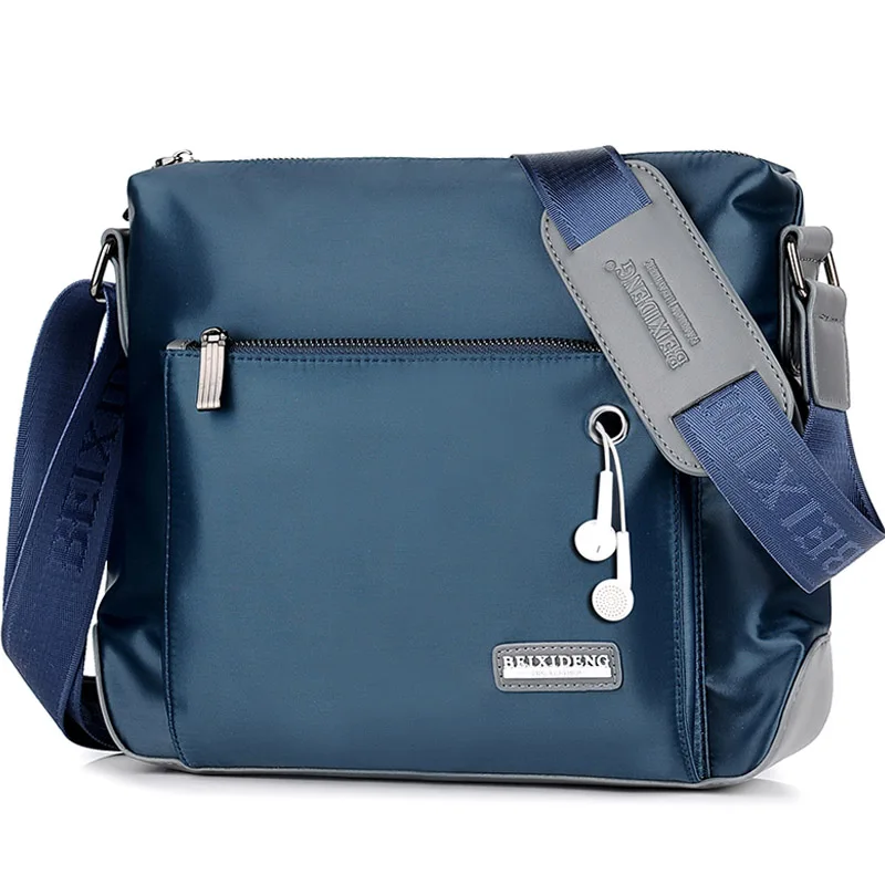 New Men's Shoulder Bag Headphone Hole Oxford Cloth Material Waterproof Multifunctional Design Casual Student Messenger Bag 
New Men's Shoulder Bag Headphone Hole Oxford Cloth Material Waterproof Multifunctional Design Casual Student Messenger Bag