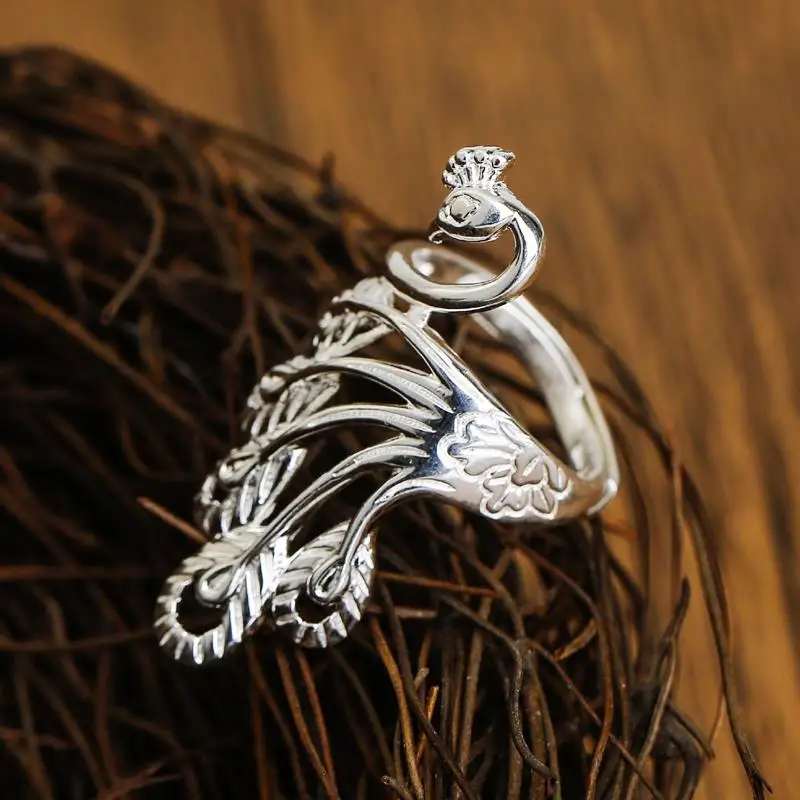 The new Thai silver hollow ethnic style peacock ring opening adjustable atmosphere exaggerated Chinese women's jewelry
The new Thai silver hollow ethnic style peacock ring opening adjustable atmosphere exaggerated Chinese women's jewelry