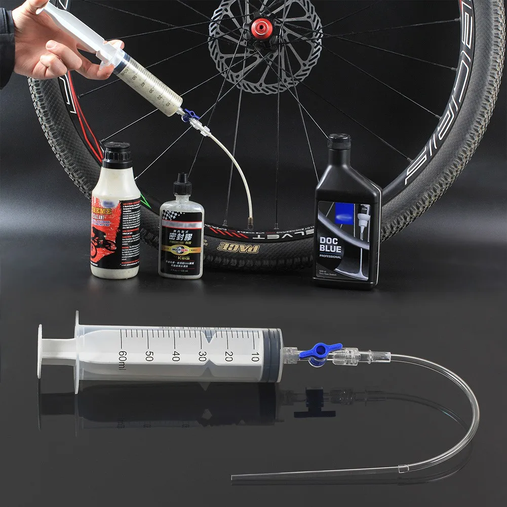 60ml MTB Bike Tubeless Tyre Tepair Fluid Injection Tool Plastic Rubber Bicycle Hose Kit Cycling Repair Tools Cycling Accessory
60ml MTB Bike Tubeless Tyre Tepair Fluid Injection Tool Plastic Rubber Bicycle Hose Kit Cycling Repair Tools Cycling Accessory