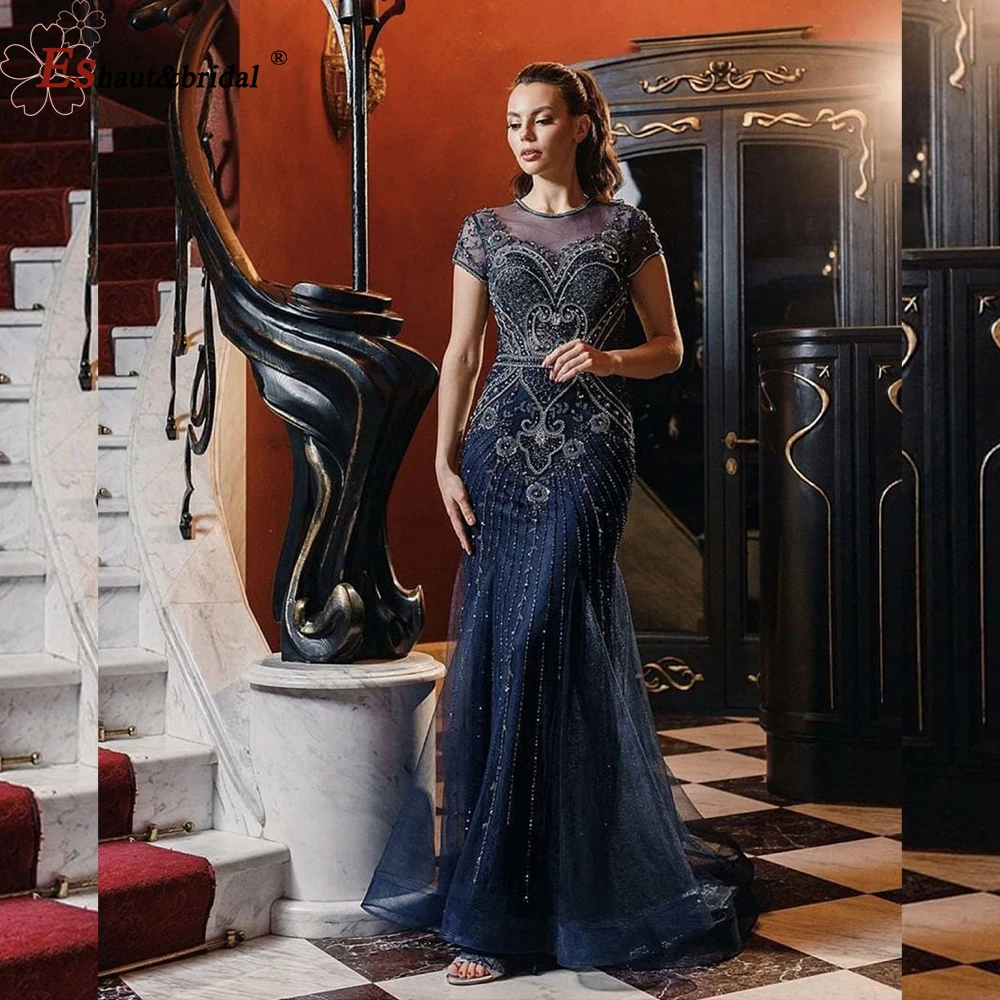 Dubai Navy Blue Mermaid O-Neck Evening Night Dresses for Women 2022 Beads Sequin Cap Sleeves Formal Wedding Prom Party Gowns
Dubai Navy Blue Mermaid O-Neck Evening Night Dresses for Women 2022 Beads Sequin Cap Sleeves Formal Wedding Prom Party Gowns