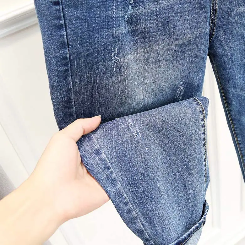European casual solid color large loose Harem Pants fashion mid waist elastic belt lace up women's jeans
European casual solid color large loose Harem Pants fashion mid waist elastic belt lace up women's jeans