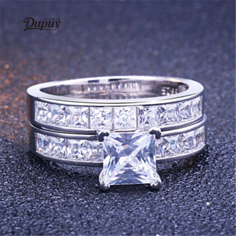 DUPUY Sterling Silver 6.5MM Princess Cut Cubic Zirconia Ring Engagement Ring Wedding Ring Bridal Ring Set
DUPUY Sterling Silver 6.5MM Princess Cut Cubic Zirconia Ring Engagement Ring Wedding Ring Bridal Ring Set