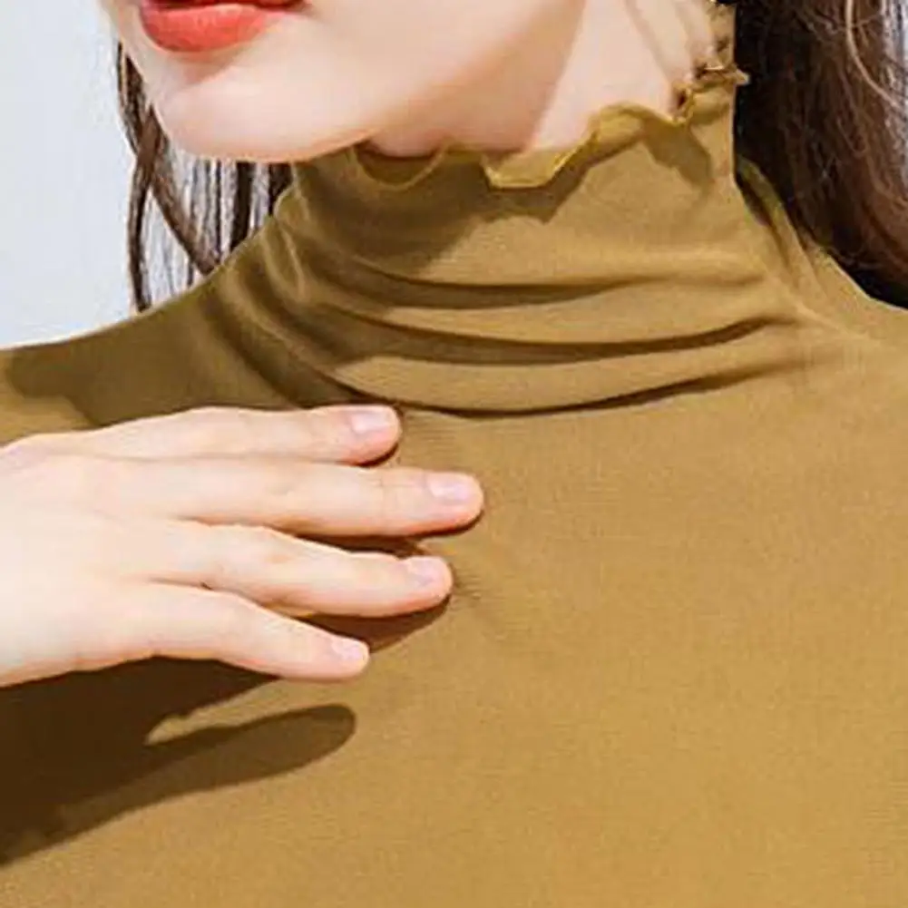 Women Long Sleeve Turtle Neck Solid Color Wavy Hem Slim Basic Blouse T-shirt 
Women Long Sleeve Turtle Neck Solid Color Wavy Hem Slim Basic Blouse T-shirt
