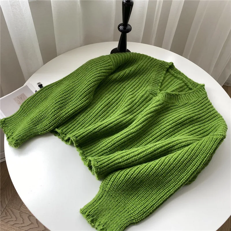 2020 Autumn Winter New Net Red Exquisite V Neck Solid Color Knitted Sweater Women's Casual Oversized All Match Tops For Fashion 
2020 Autumn Winter New Net Red Exquisite V Neck Solid Color Knitted Sweater Women's Casual Oversized All Match Tops For Fashion