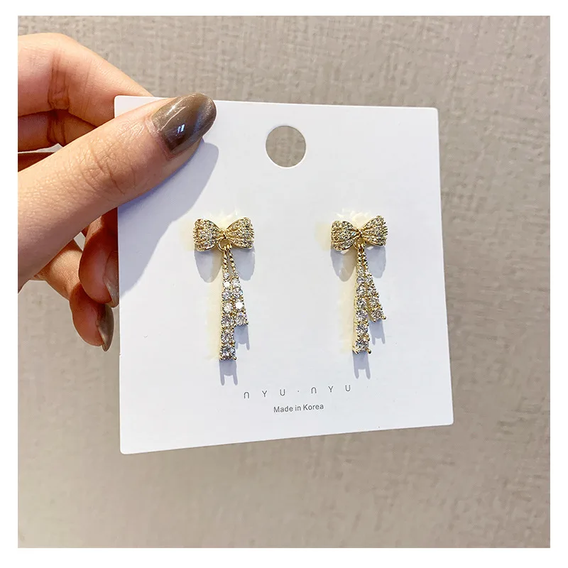 Bow full diamond tassel earrings female Korean fashion temperament earrings 
Bow full diamond tassel earrings female Korean fashion temperament earrings