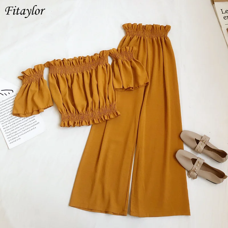 Fitaylor 2022 New Summer Women Casual Solid Color Off Shoulder Short Tops+Elastic Waist Wide Leg Long Pants Sexy Two Piece Set 
Fitaylor 2022 New Summer Women Casual Solid Color Off Shoulder Short Tops+Elastic Waist Wide Leg Long Pants Sexy Two Piece Set