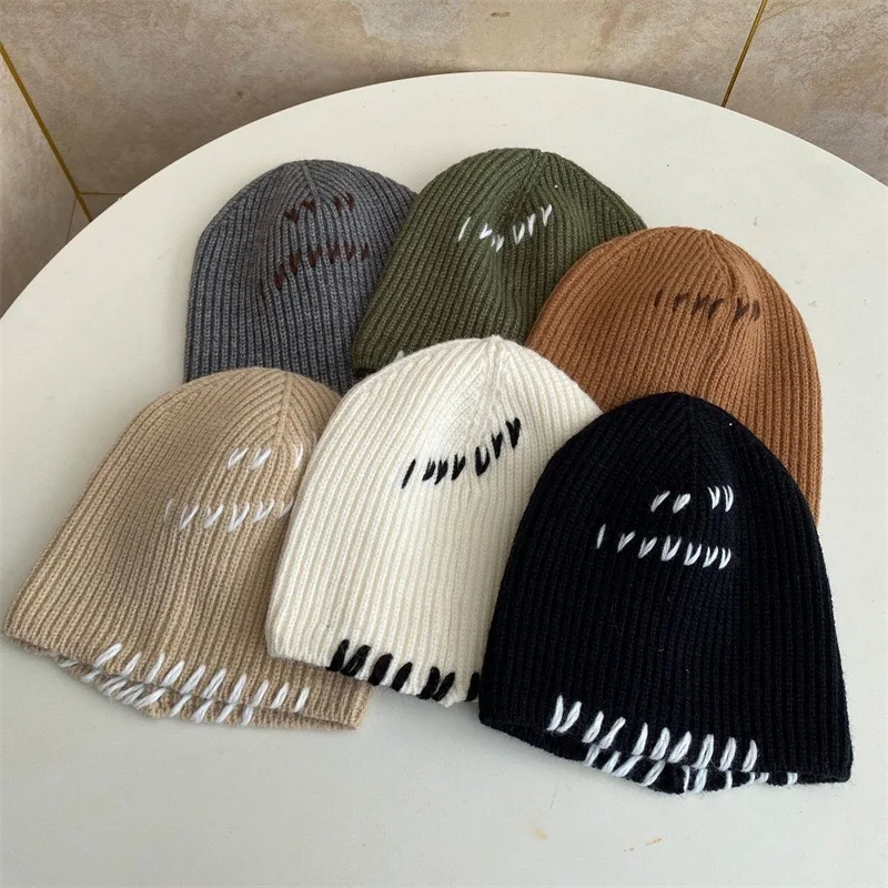 ins hand-stitched stringed knitted cold hat men and women detail top stitch embroidery lovers wool hat ear protection toe cap
ins hand-stitched stringed knitted cold hat men and women detail top stitch embroidery lovers wool hat ear protection toe cap