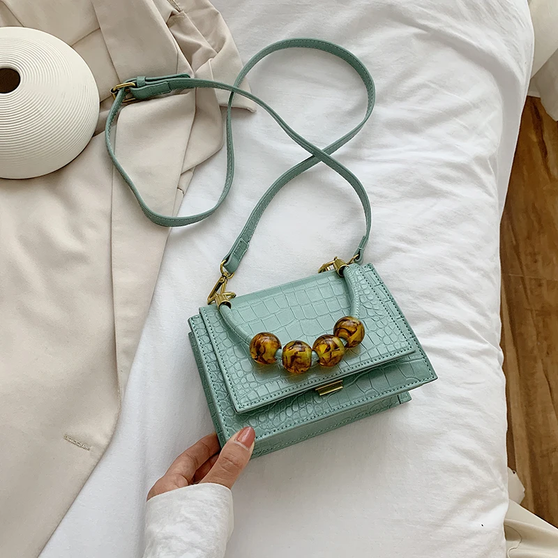 Artificial fur handbag, crocodile pattern for women, small square shoulder strap, fashionable 
Artificial fur handbag, crocodile pattern for women, small square shoulder strap, fashionable