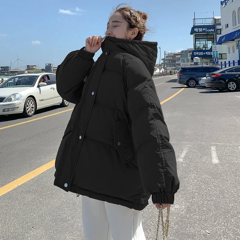 Hooded cotton jacket women Korean version loose winter new Hong Kong style Harajuku thickened bread clothing trend 
Hooded cotton jacket women Korean version loose winter new Hong Kong style Harajuku thickened bread clothing trend
