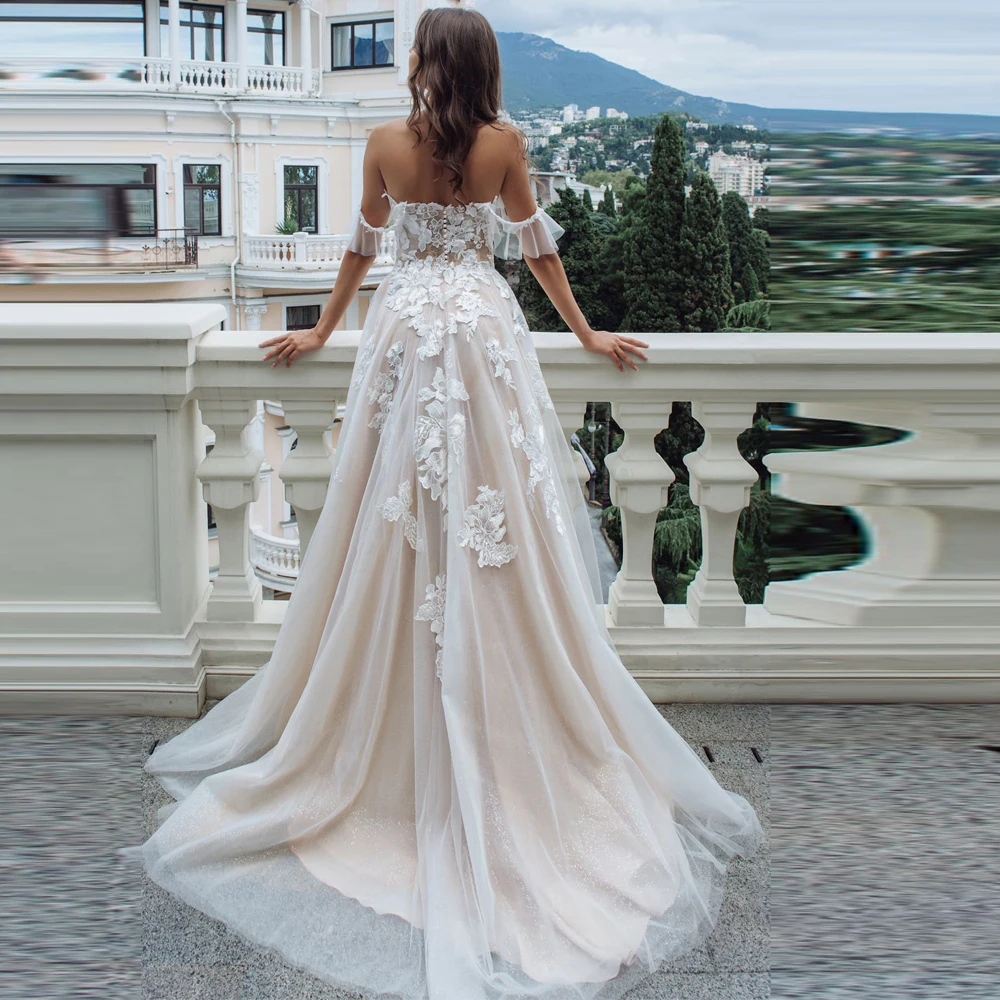 Vestidos Elegant Wedding Dresses Tulle Illusion Appliques Sweetheart Off-Shoulder Covered Button Ball Bridal Gowns
Vestidos Elegant Wedding Dresses Tulle Illusion Appliques Sweetheart Off-Shoulder Covered Button Ball Bridal Gowns