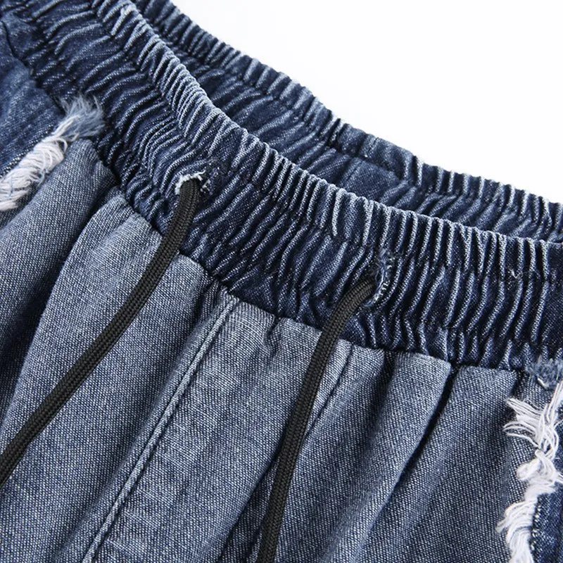 New Women's Fashion Stitching Color High Waist Tie Wide Loose Feet Jeans Blue
New Women's Fashion Stitching Color High Waist Tie Wide Loose Feet Jeans Blue