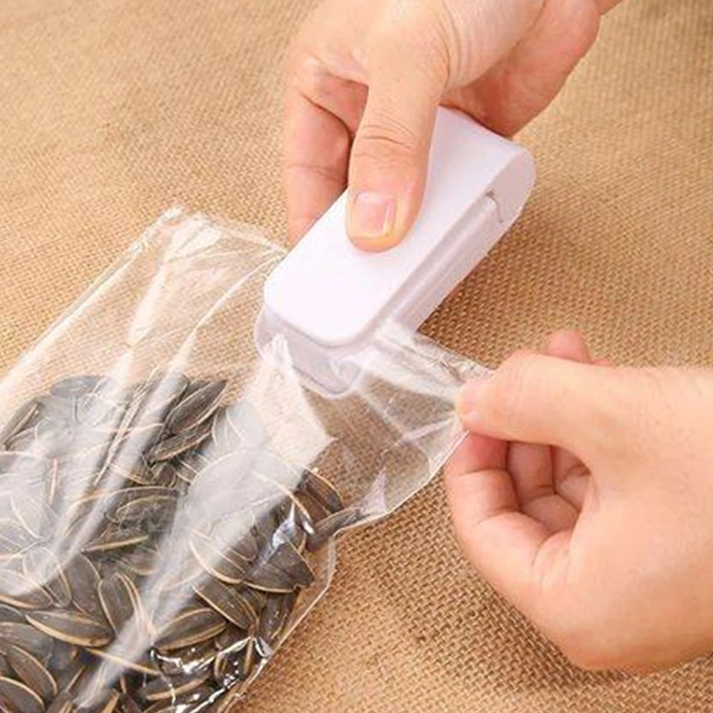 Mini Sealer Kitchen Storage Bag Clips Home Heat Bag Plastic Food Snacks Bag Sealing Machine Food Packaging TooI
Mini Sealer Kitchen Storage Bag Clips Home Heat Bag Plastic Food Snacks Bag Sealing Machine Food Packaging TooI
